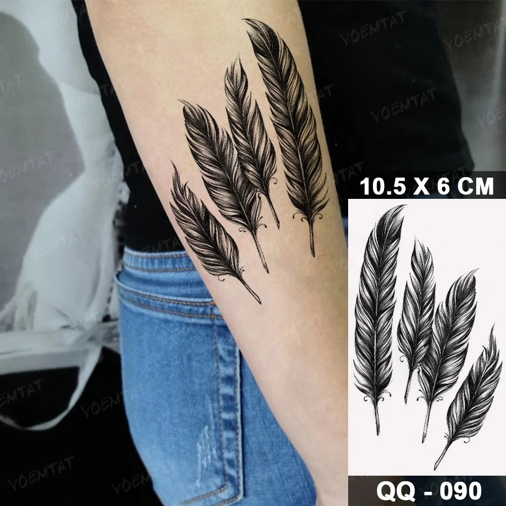 Soaring Feathers Arm Tattoo