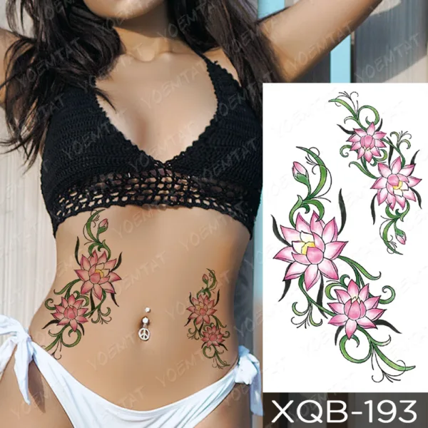 Temporary tattoo of pink lotus flowers with green leaves on the side torso