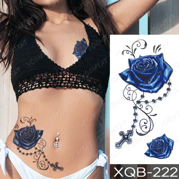 Stunning blue rose with chain temporary tattoo on a side torso.