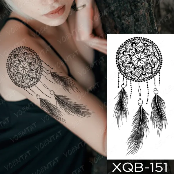 Intricate mandala with feathers in a medium-sized dreamcatcher temporary tattoo.